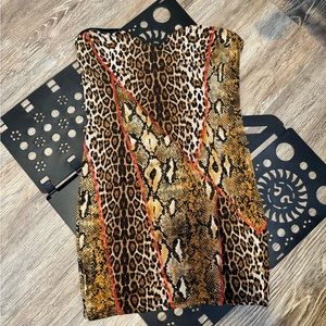 Leopard strapless dress .